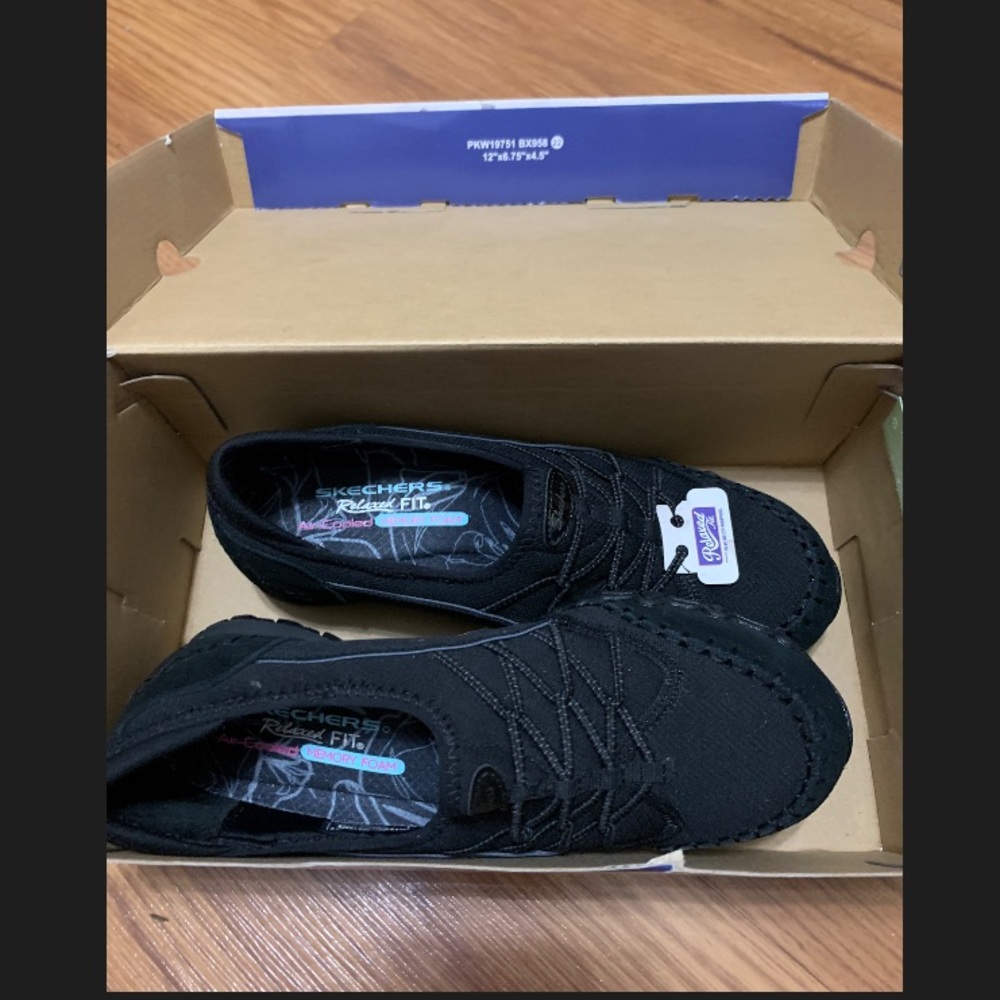 Sketcher slip-ons